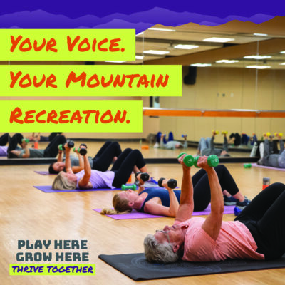 people doing yoga in a fitness studio